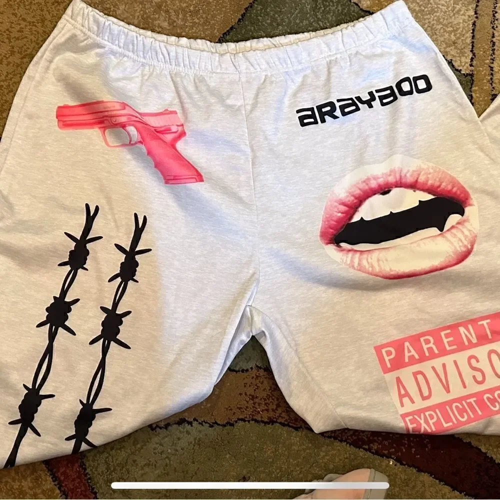Y2K Printed joggers. Elastic at the ankle letter print with pockets. . Polyester